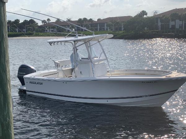 Regulator 23 Forward Seating 2018 Regulator 23 Forward Seating boat on water, with Yamaha outboard motor.