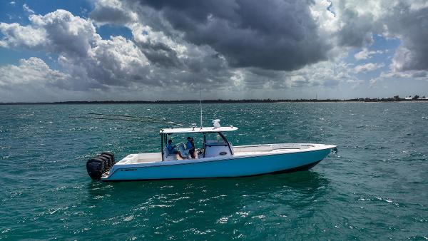 Contender 44 ST 2020 Contender 44 ST boat on open water under cloudy sky.