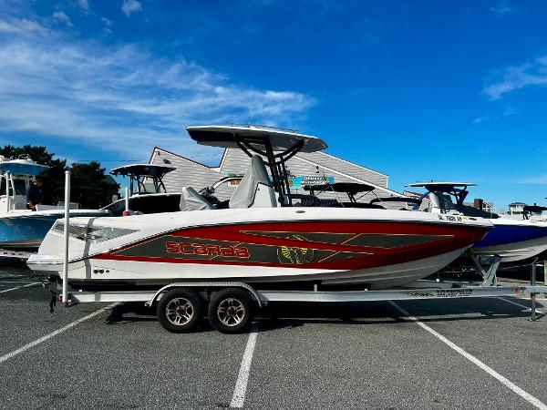 Scarab 255 Open ID 2019 Scarab 255 Open ID boat on trailer under clear blue sky.