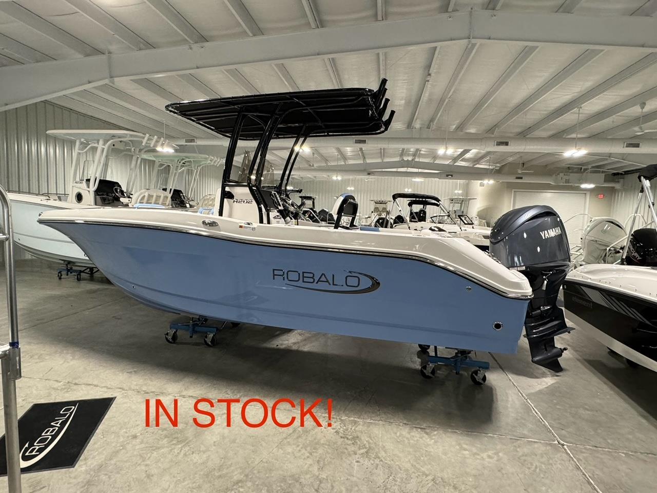 Robalo R202 Explorer 2025 Robalo R202 Explorer boat in showroom, available for purchase.
