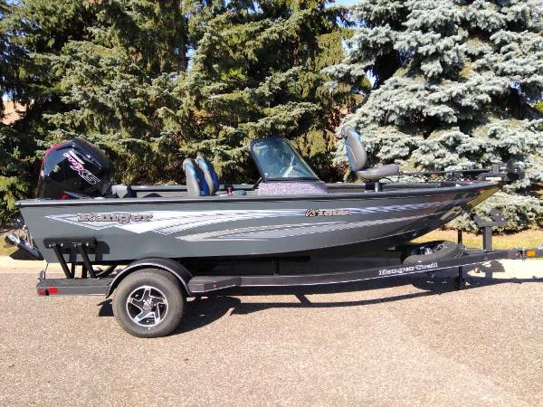 Ranger VS1682SC Angler 2024 Ranger VS1682SC Angler boat on trailer, parked outdoors.