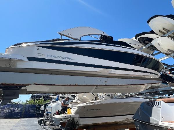 Regal 2500 Bowrider 2010 Regal 2500 Bowrider boat in storage at a marina.