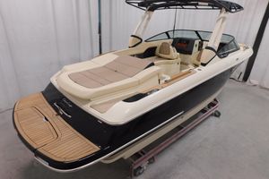 Chris-Craft Sportster 28 2025 Chris-Craft Sportster 28 boat with elegant design and luxurious seating.