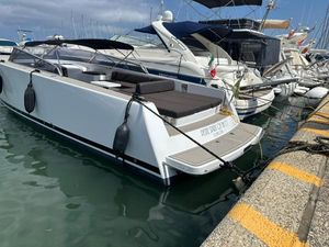 VanDutch 40 VanDutch 40 yacht docked at marina, 2009 model, sleek design, white exterior, calm water.