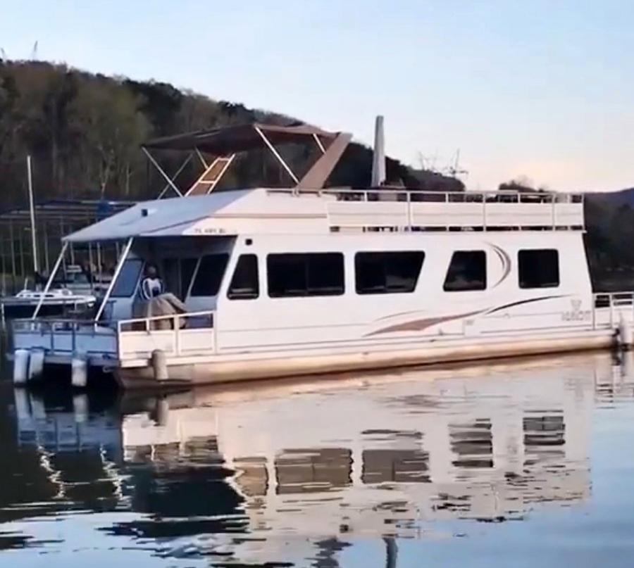 Myacht M Yacht 2001 Myacht M Yacht on calm water, surrounded by scenic landscape.