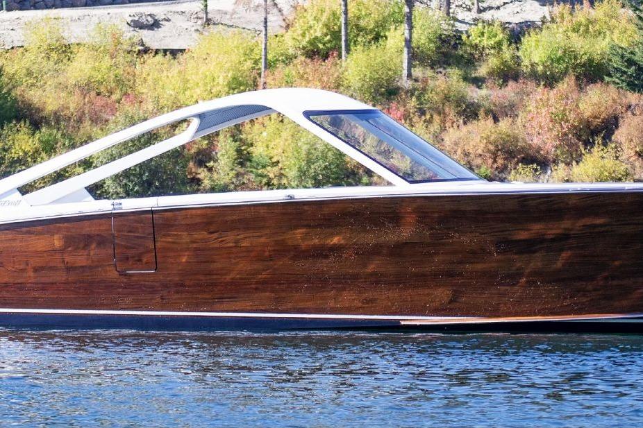 Stancraft 390 Hammerhead Coupe 2021 StanCraft 390 Hammerhead Coupe on a serene lake with lush greenery.