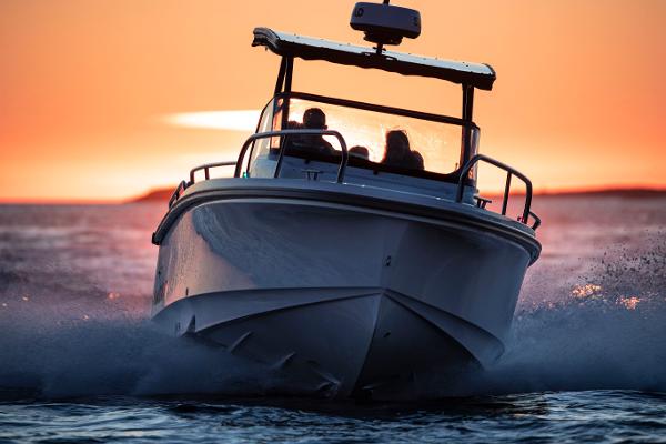 Nimbus T8 Nimbus T8 boat cruising at sunset, 2024 model.