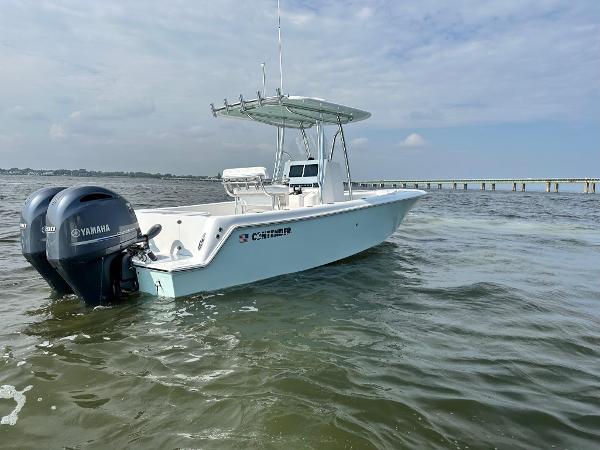 Contender 25 Tournament 2024 Contender 25 Tournament boat with Yamaha engines on open water.