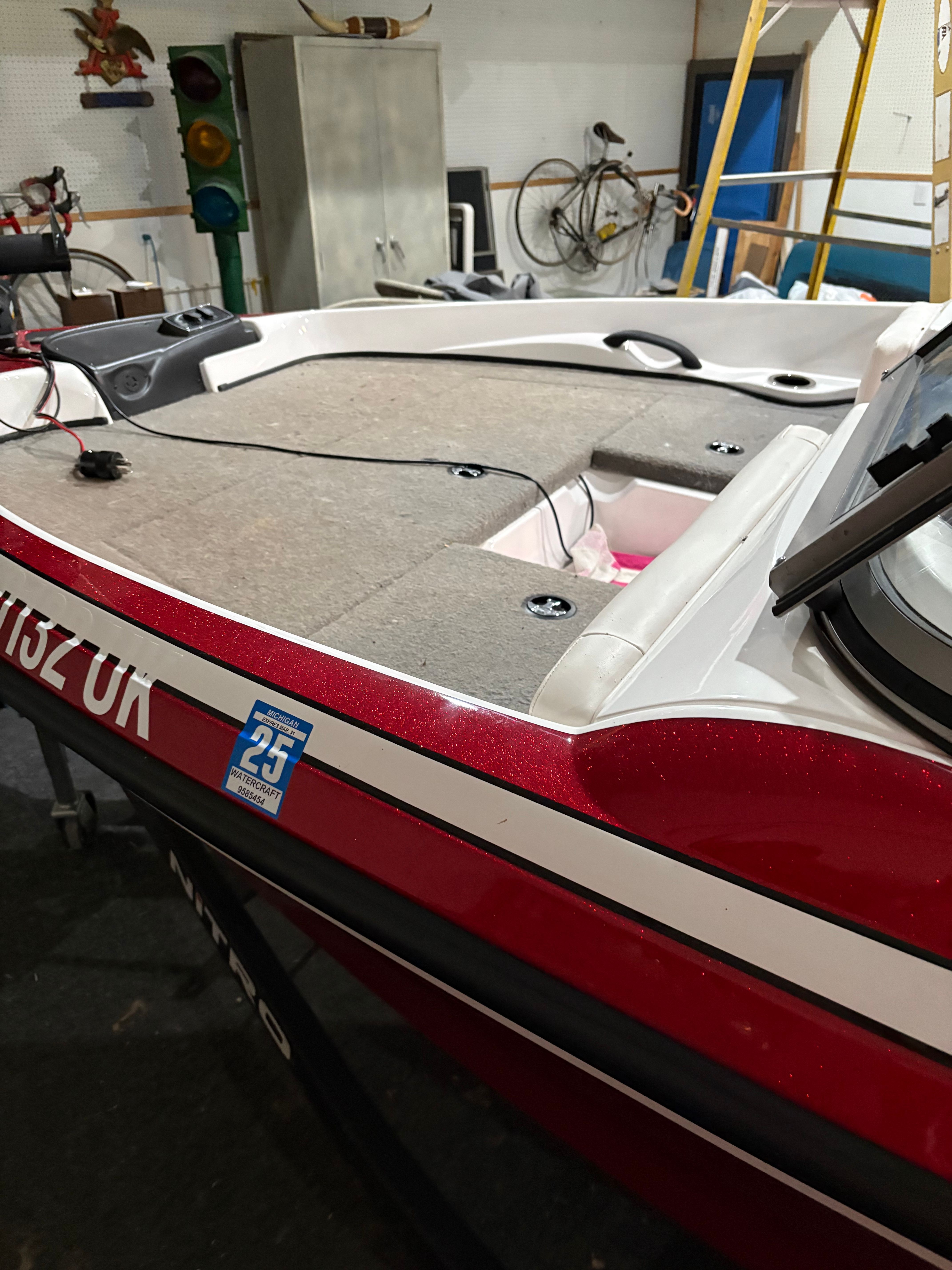 Nitro Z19 Sport 2019 Nitro Z19 Sport boat in garage, red and white design, registration sticker visible.