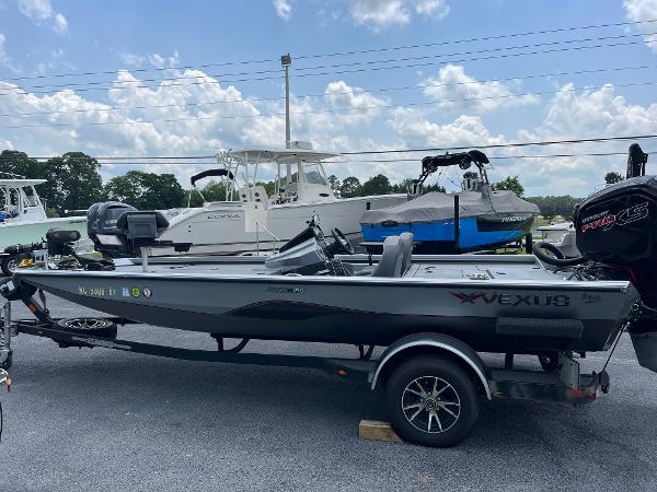 Vexus AVX189 2022 Vexus AVX189 boat on trailer, parked outdoors under a cloudy sky.