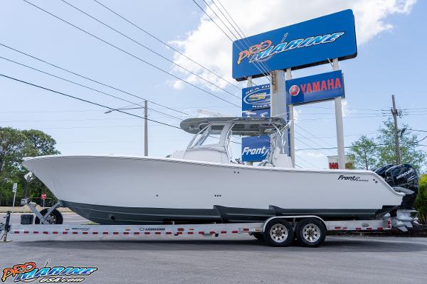 Front Runner 36 Center Console 2023 Front Runner 36 Center Console boat on trailer at dealership.