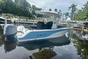 Sea Fox 248 Commander 2022 Sea Fox 248 Commander boat docked in a serene marina setting.