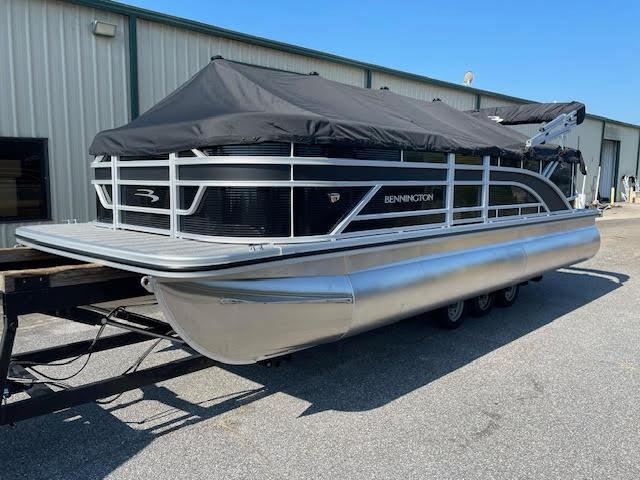 Bennington 22S 2025 Bennington 22S pontoon boat with black cover on a trailer.