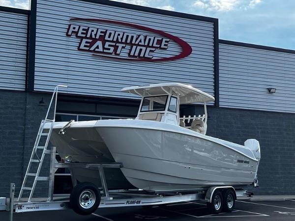 Twin Vee 260 GFX CC 2024 Twin Vee 260 GFX CC boat on trailer at Performance East Inc. dealership.