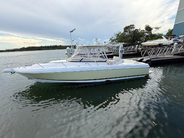Intrepid 350 Center Console 2006 Intrepid 350 Center Console boat docked on calm water.
