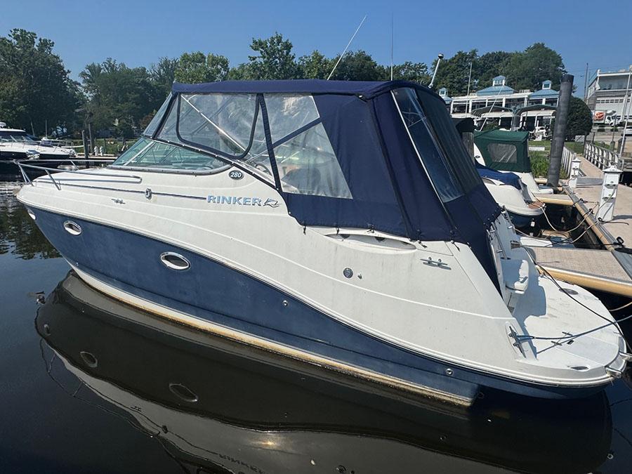 Rinker 280 Express Cruiser 2008 Rinker 280 Express Cruiser docked at marina, blue and white exterior.