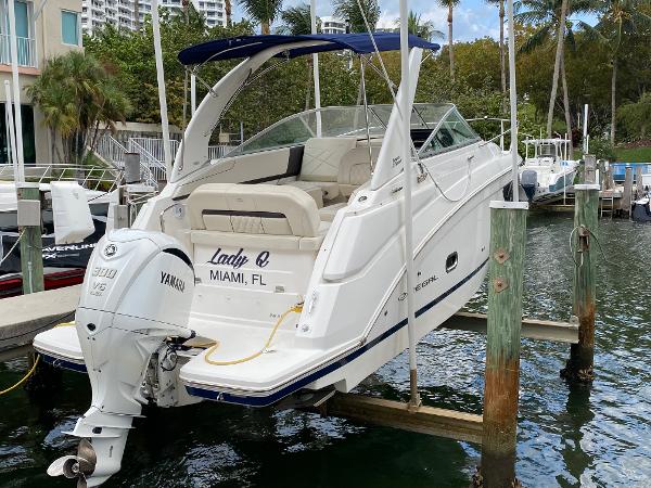 Regal 26 XO 2022 Regal 26 XO boat docked in Miami with Yamaha outboard motor.
