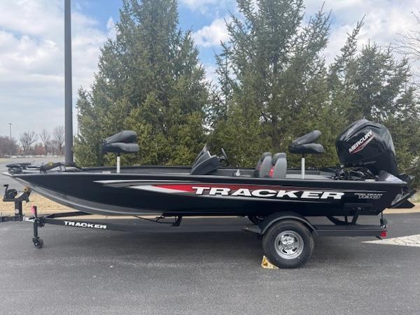 Tracker Pro Team 190 2025 Tracker Pro Team 190 boat on trailer, parked outdoors.