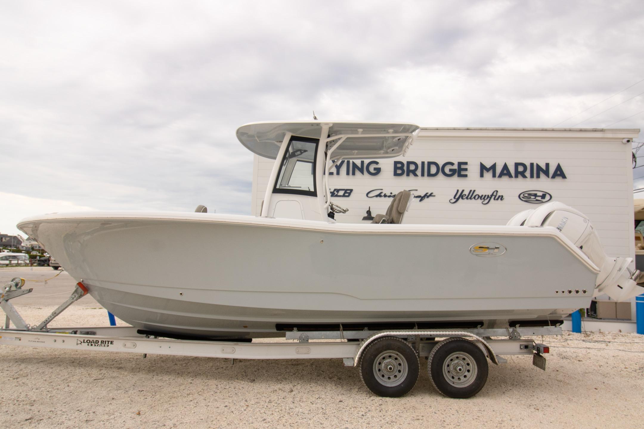 Sea Hunt Gamefish 25 2026 Sea Hunt Gamefish 25 boat on trailer at Flying Bridge Marina.