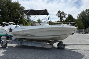 Jeanneau Cap Camarat 5.5 CC Serie 2 2013 Jeanneau Cap Camarat 5.5 CC Serie 2 boat on trailer, parked outdoors.