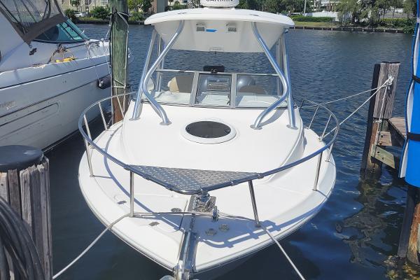 Sea Fox 256 Voyager 2018 Sea Fox 256 Voyager docked at a marina.