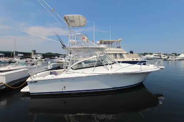 Luhrs 28 Open 2007 Luhrs 28 Open boat docked in a marina, clear sky background.