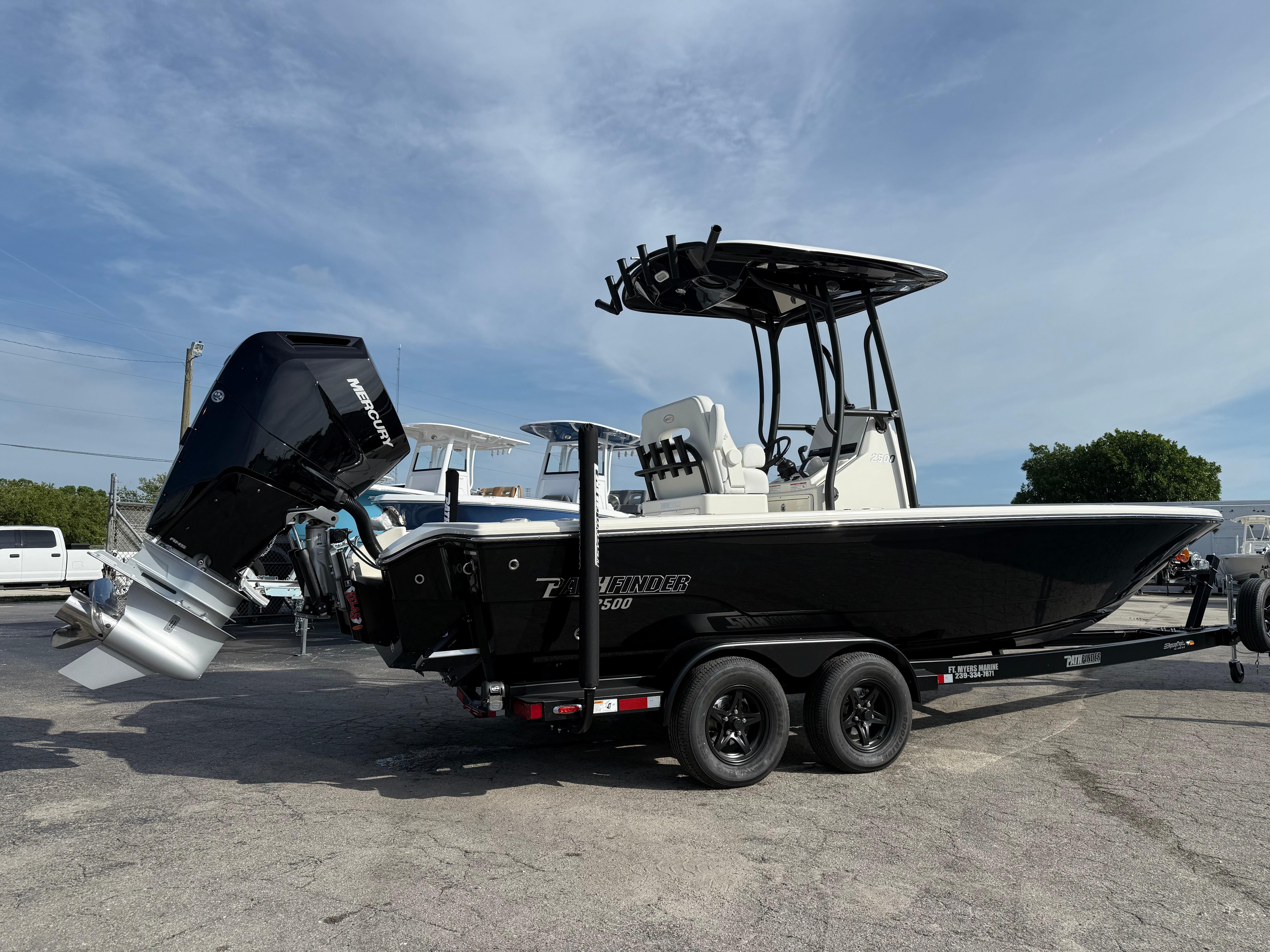 Pathfinder 2500 Hybrid 2025 Pathfinder 2500 Hybrid boat on trailer, featuring a Mercury outboard motor.