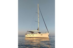 Bavaria Cruiser 41 2014 Bavaria Cruiser 41 sailboat on calm water at sunset.