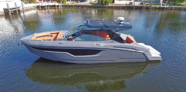 Cruisers Yachts 38 GLS 2023 Cruisers Yachts 38 GLS luxury boat on calm water.