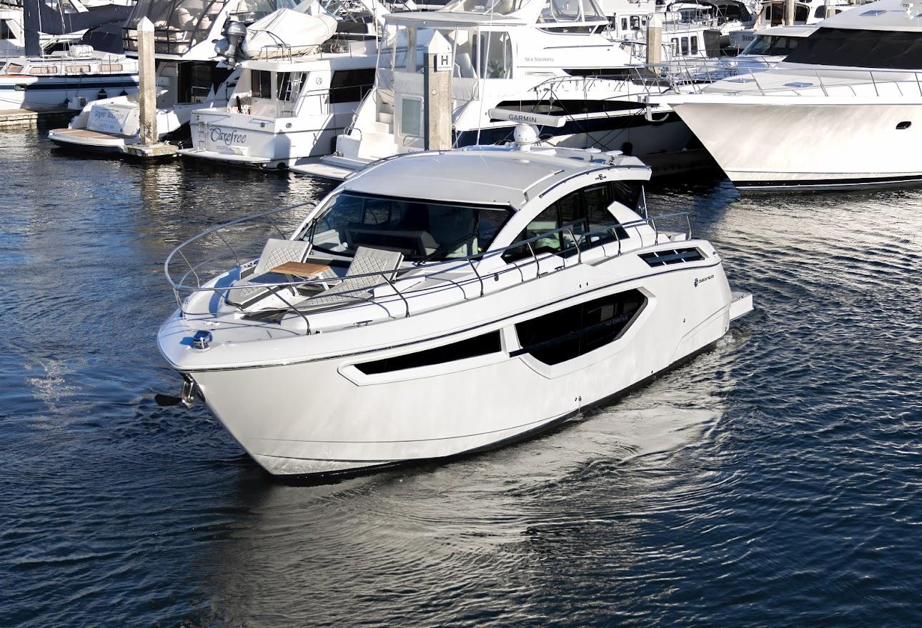 Cruisers Yachts Cantius 2020 Cruisers Yachts Cantius in marina, sleek design, luxury motor yacht.