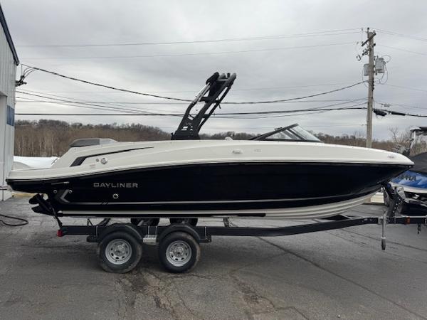 Bayliner VR6 Bowrider I/O 2025 Bayliner VR6 Bowrider I/O boat on trailer, parked outdoors.