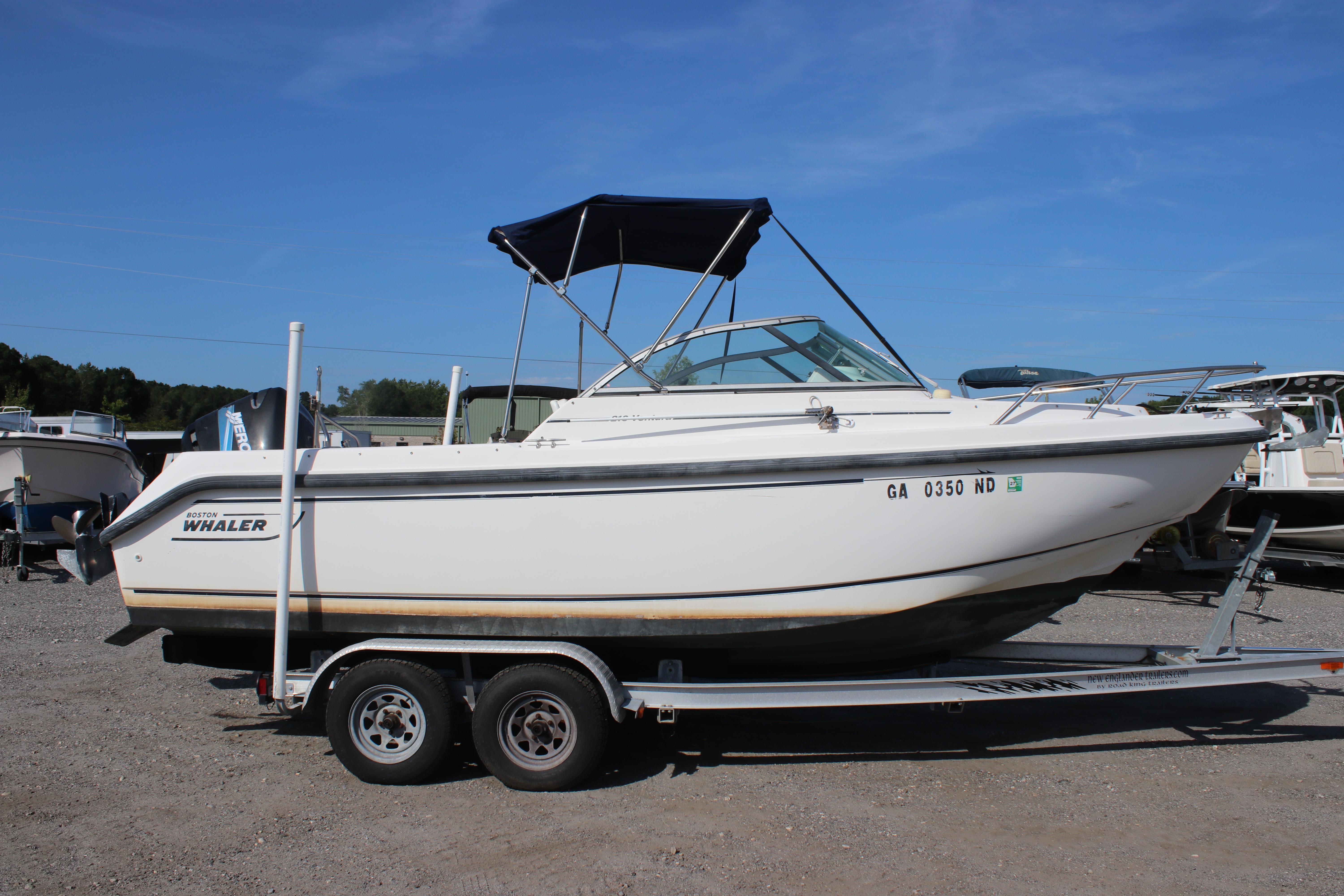 Boston Whaler 210 Ventura 2004 Boston Whaler 210 Ventura boat on trailer, side view, sunny day.