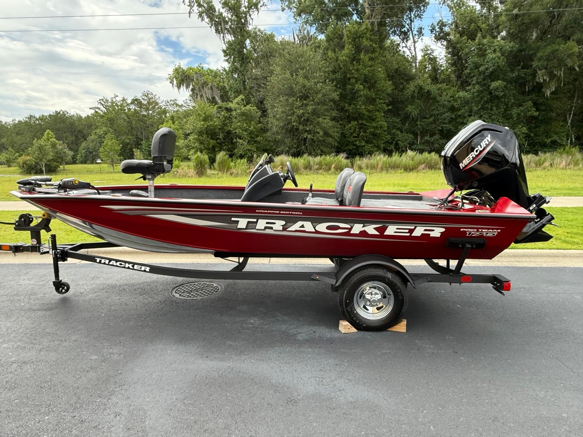Tracker Pro Team 175 Crappie Edition 2025 Tracker Pro Team 175 Crappie Edition boat on trailer, parked outdoors.