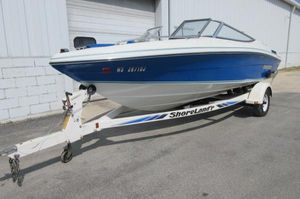 Rinker 186 Captiva 1993 Rinker 186 Captiva boat on ShoreLand'r trailer, blue and white.