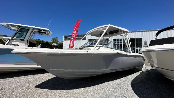 Key West 239 DFS 2025 Key West 239 DFS boat displayed outdoors on gravel, under clear blue sky.