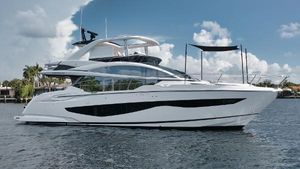 Pearl 62 Luxury Pearl 62 yacht, 2022 model, cruising on calm waters under a partly cloudy sky.