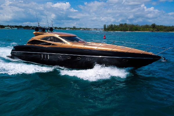 Sunseeker Predator 68 2005 Sunseeker Predator 68 yacht cruising on blue water under a cloudy sky.