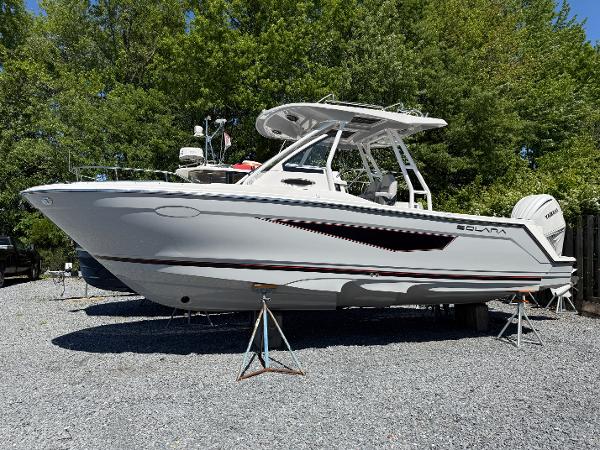Solara S-250 CW 2025 Solara S-250 CW boat on stands, surrounded by trees.