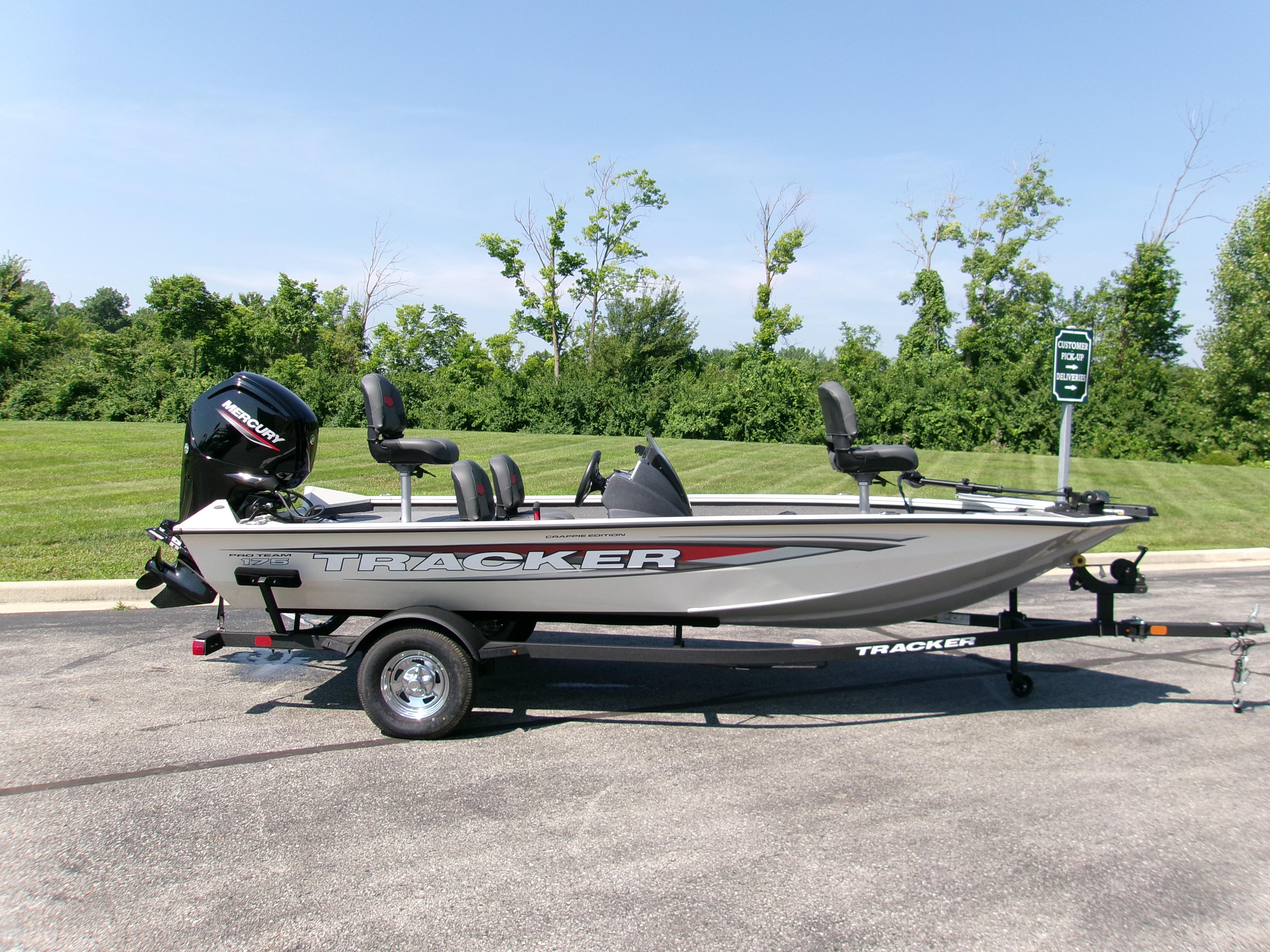 Tracker Pro Team 175 Crappie Edition 2025 Tracker Pro Team 175 Crappie Edition boat on trailer, parked outdoors.
