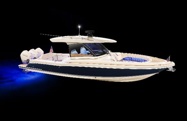 Chris-Craft Calypso 35 2025 Chris-Craft Calypso 35 boat with sleek design and blue hull lighting.