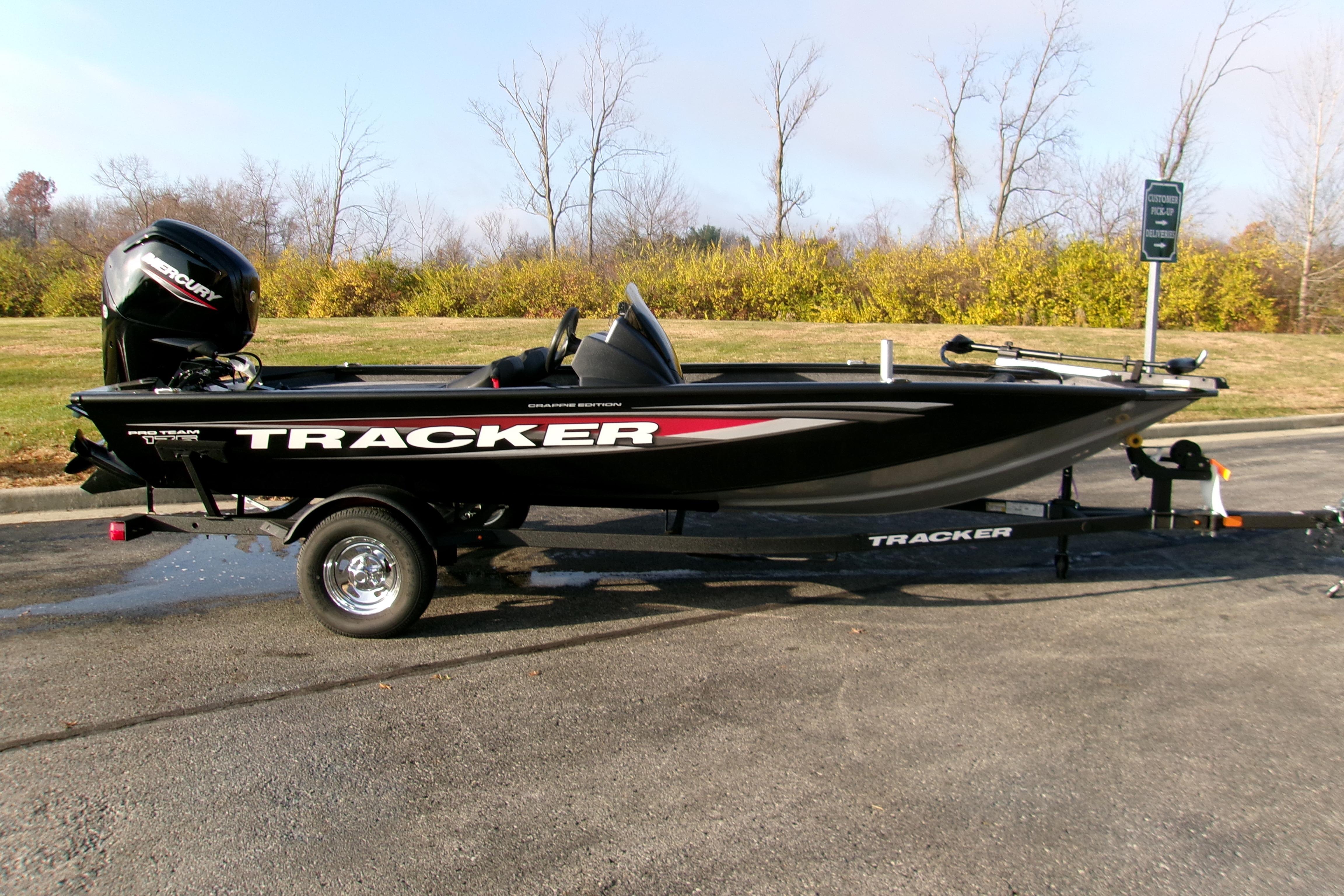 Tracker Pro Team 175 Crappie Edition 2026 Tracker Pro Team 175 Crappie Edition boat on trailer, parked outdoors.