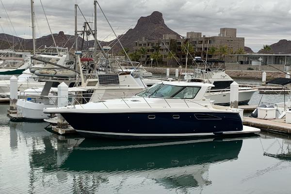 Tiara Yachts 3600 Sovran 2005 Tiara Yachts 3600 Sovran docked in a marina with mountainous backdrop.