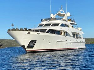Benetti Tradition 100 Luxury 2004 Benetti Tradition 100 yacht anchored in serene blue waters.