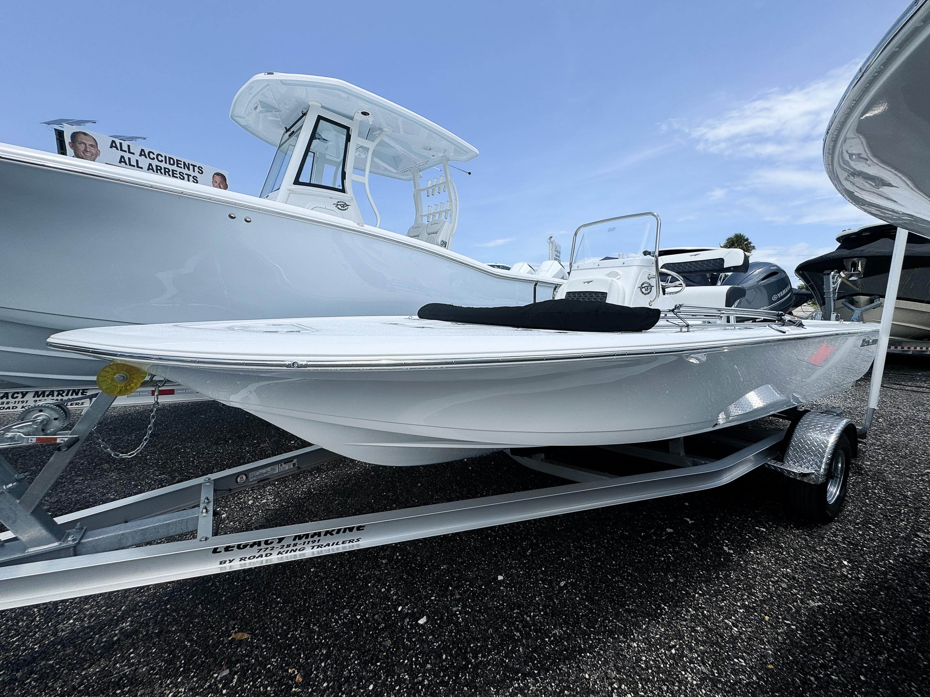 Tidewater 1910 Bay Max 2026 Tidewater 1910 Bay Max boat on trailer, displayed outdoors under clear sky.