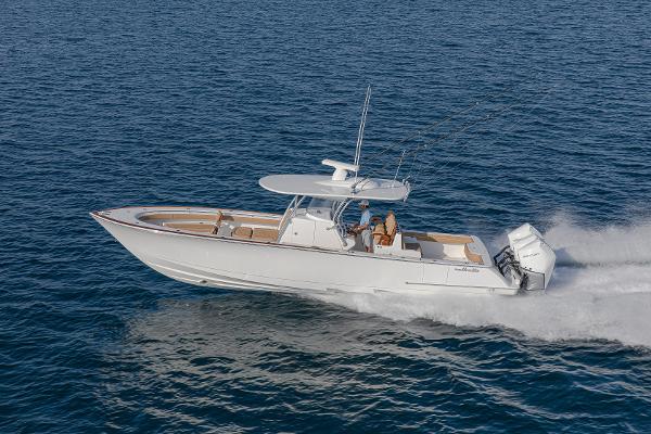 Valhalla Boatworks V-37 2026 Valhalla Boatworks V-37 cruising on open water, side view.