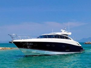 Princess V62 Luxury 2010 Princess V62 yacht cruising in clear blue waters.