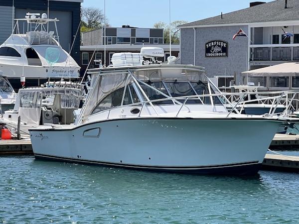Albemarle 305 Express Fisherman 1999 Albemarle 305 Express Fisherman boat docked at marina.