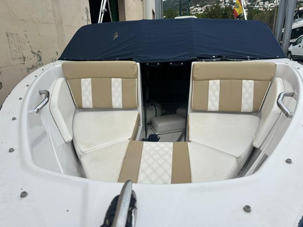 Glastron GT 185 2021 Glastron GT 185 boat interior with beige and white seating.
