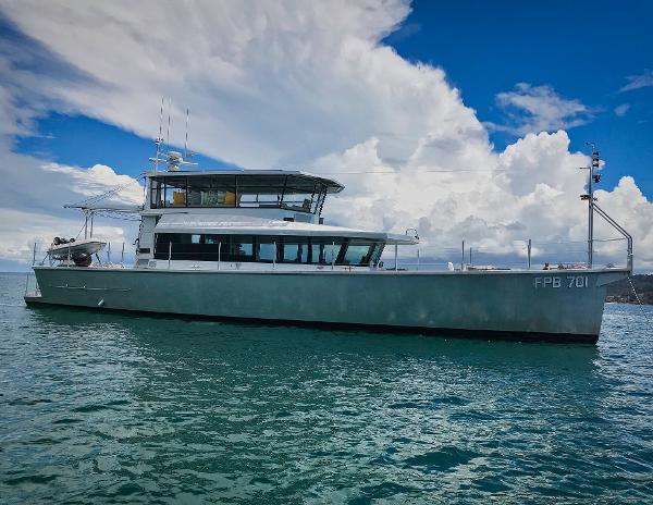 Circa Marine FPB 70 Circa Marine FPB 70 yacht, 2018 model, on calm sea under a partly cloudy sky.