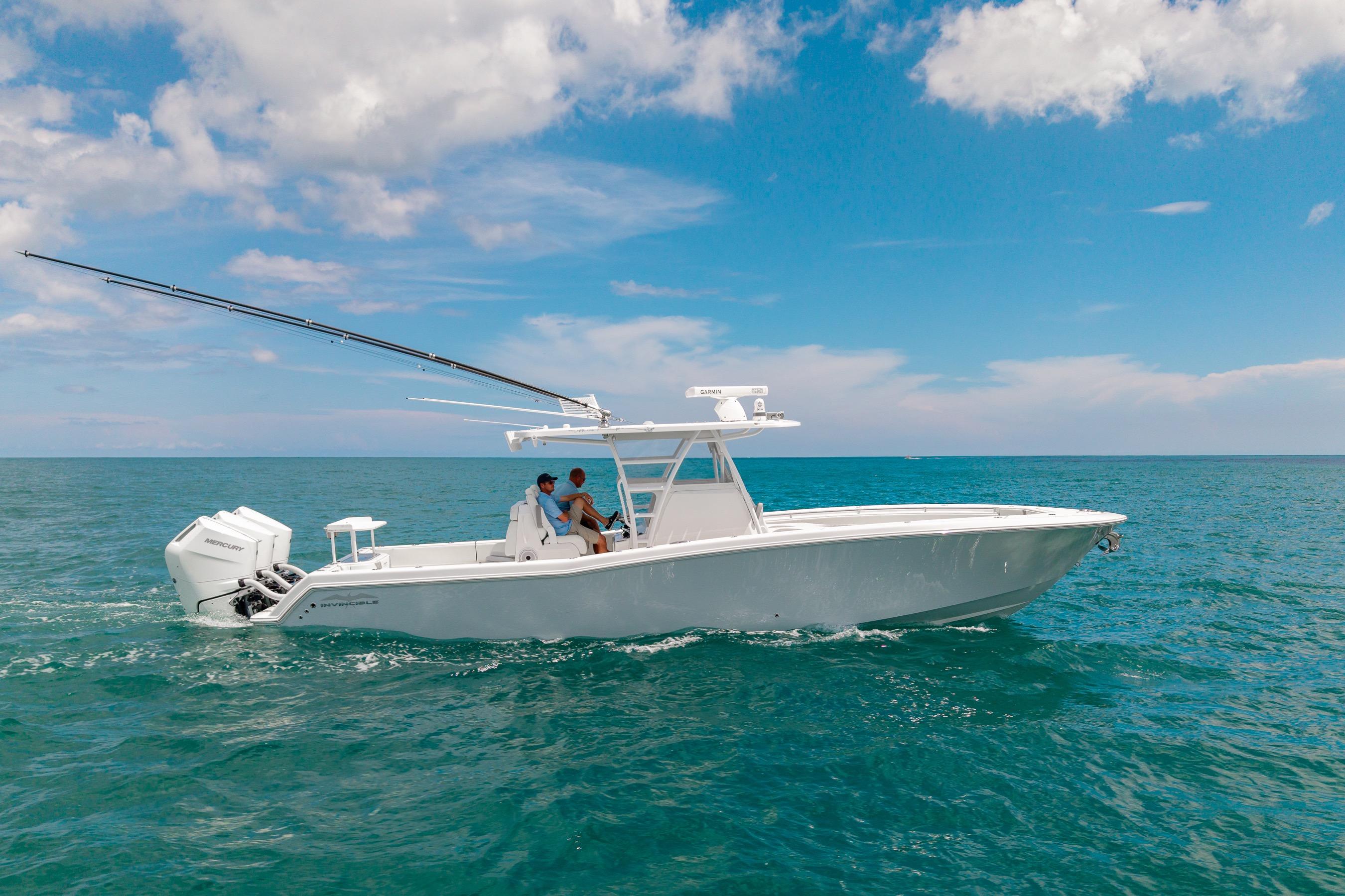 Invincible 36 Open Fisherman 2023 Invincible 36 Open Fisherman boat cruising on open ocean under blue sky.